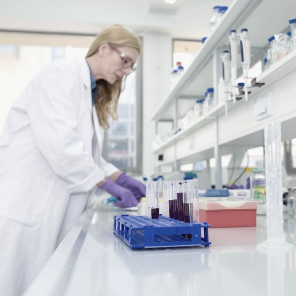 Female scientist working in clinical bioanalysis laboratory